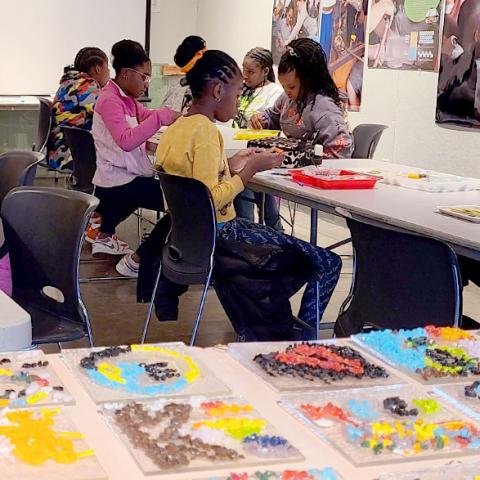 6th graders working with glass