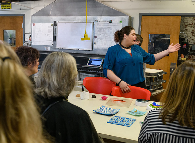 woman talking to a group of people