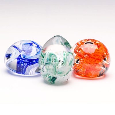 Sculpted glass paperweights