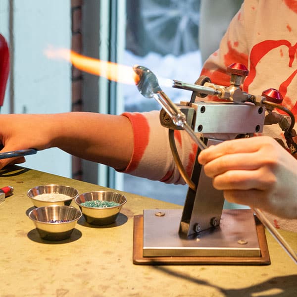 Flameworking at a torch