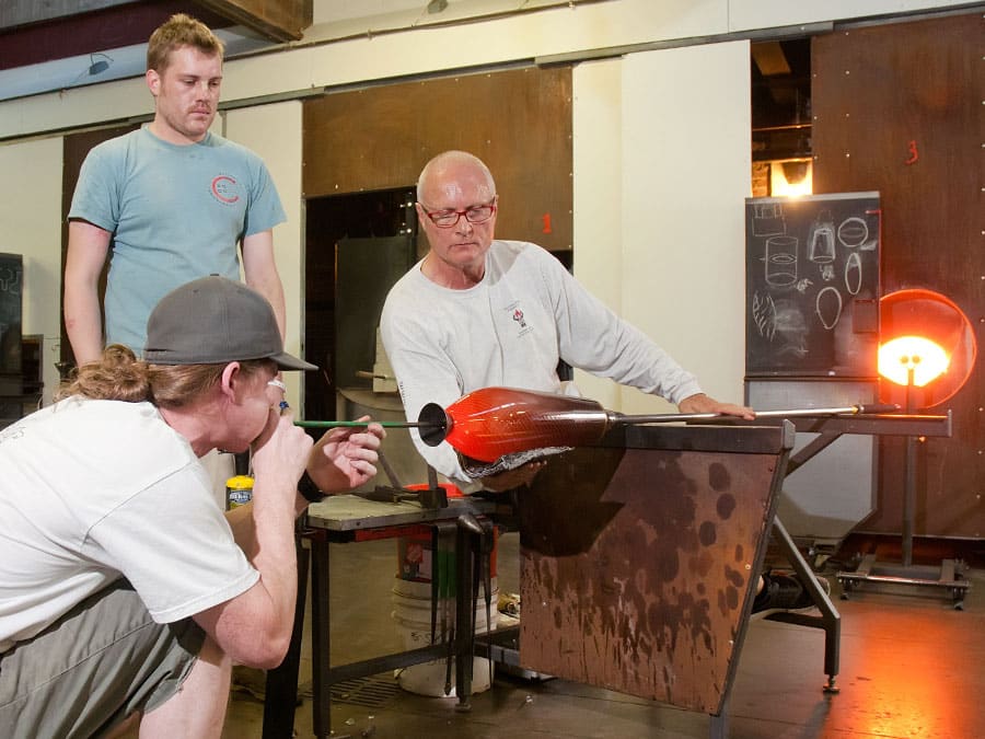 Nick Mount with glass artists at Pittsburgh Glass Center